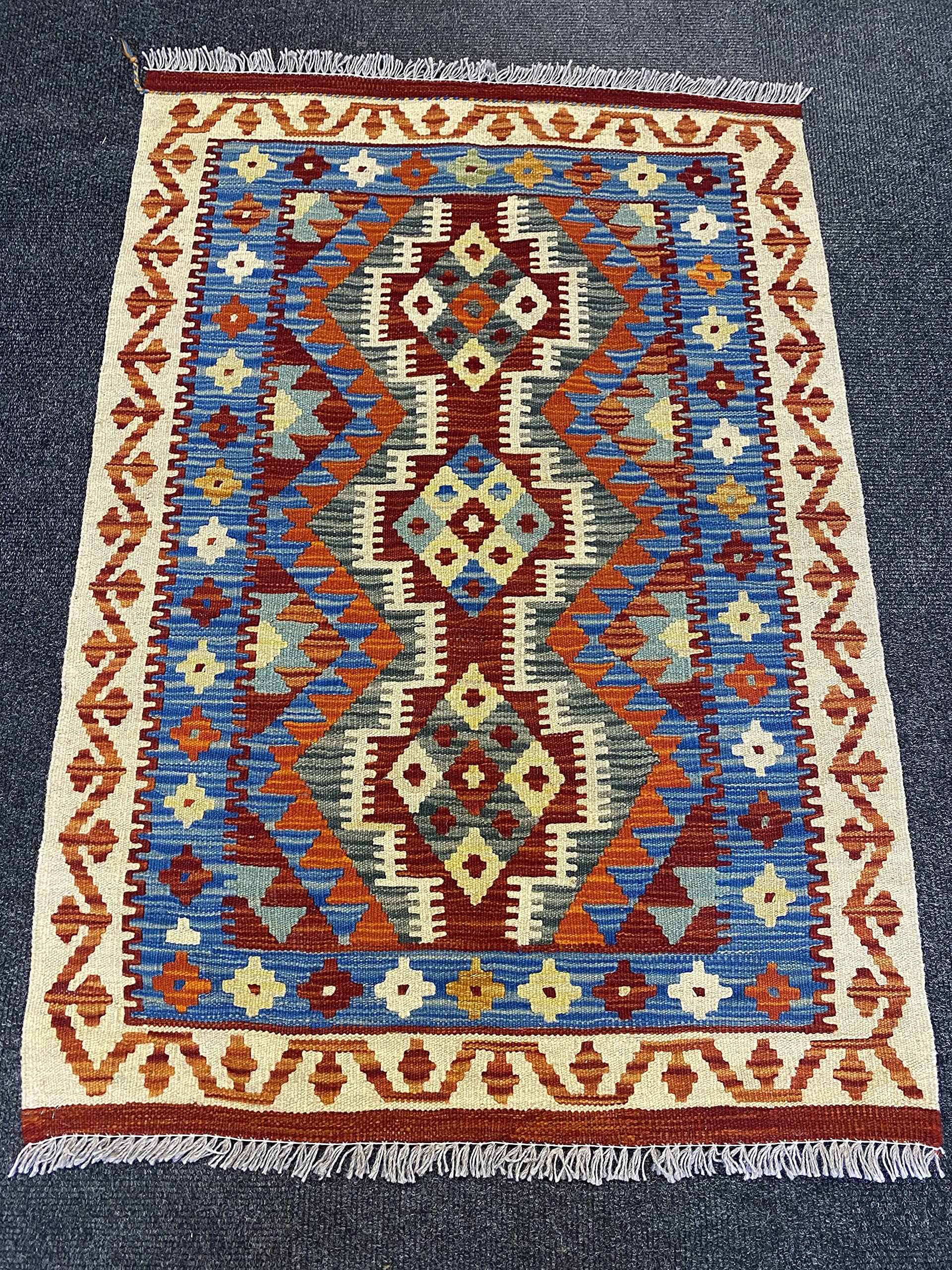Tapis oriental afghan kilim en laine fait main aux pigments végétaux