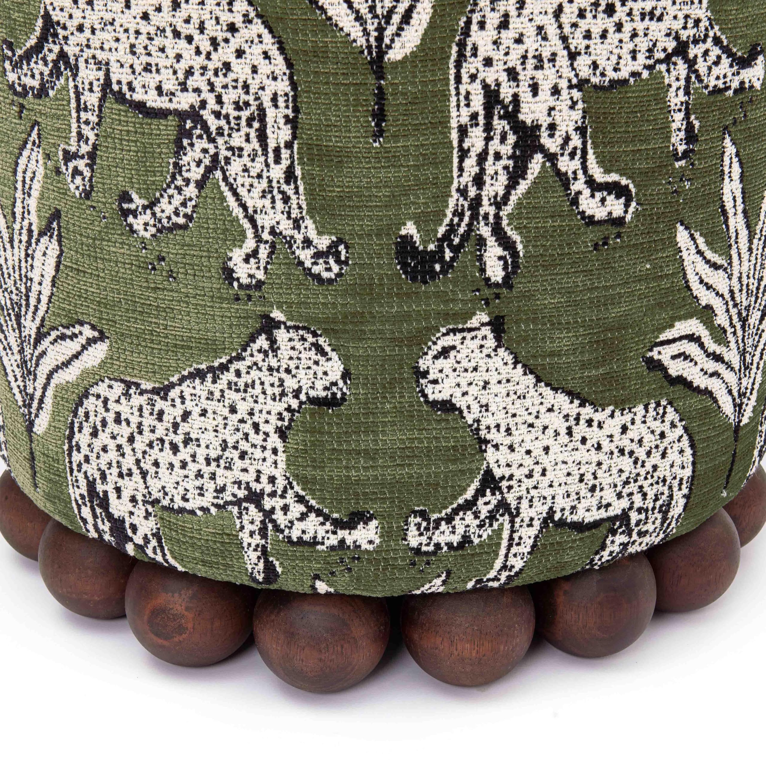 5 Floral Ottomans That Actually Work in a Real Room (2026) 3 Tov Furniture Dex Olive Green Leopard Jacquard Ottoman — product photo