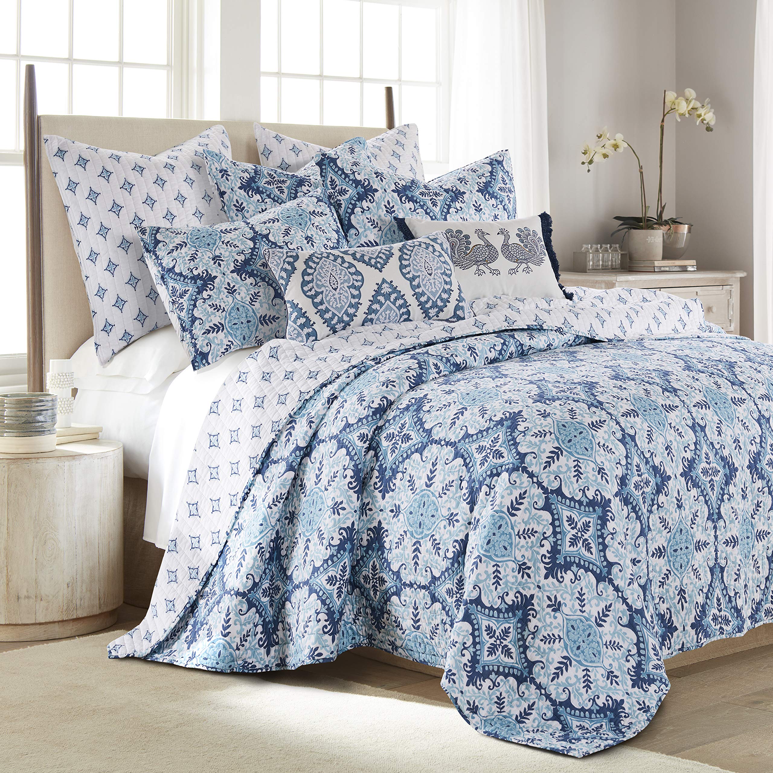 light blue and white quilt