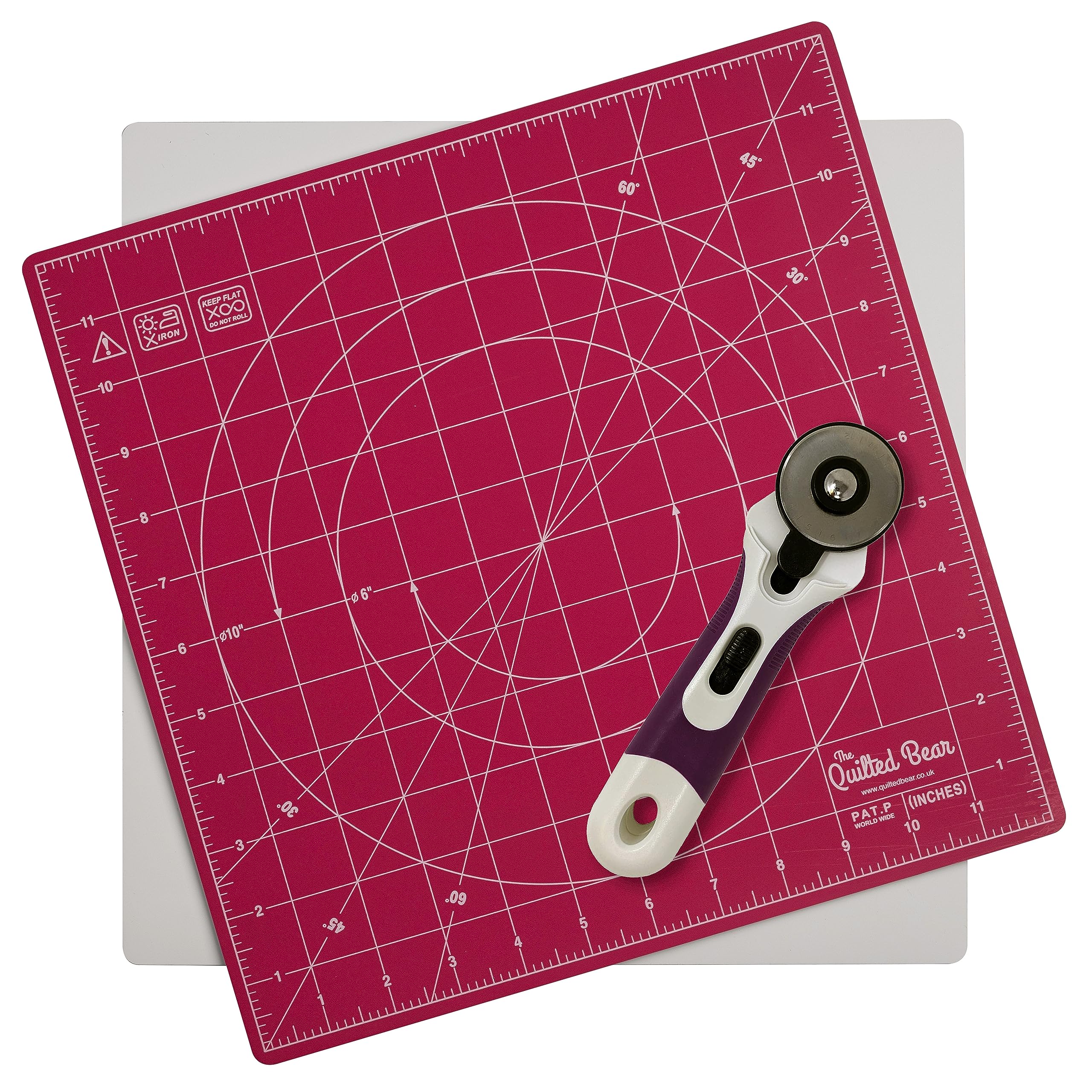 The Quilted Bear 360° Rotating & Lockable Self-Healing Cutting Mat 12" x 12" with 45mm Rotary Cutter - Pink: Your Ultimate Crafting Companion for Precision and Convenience.
