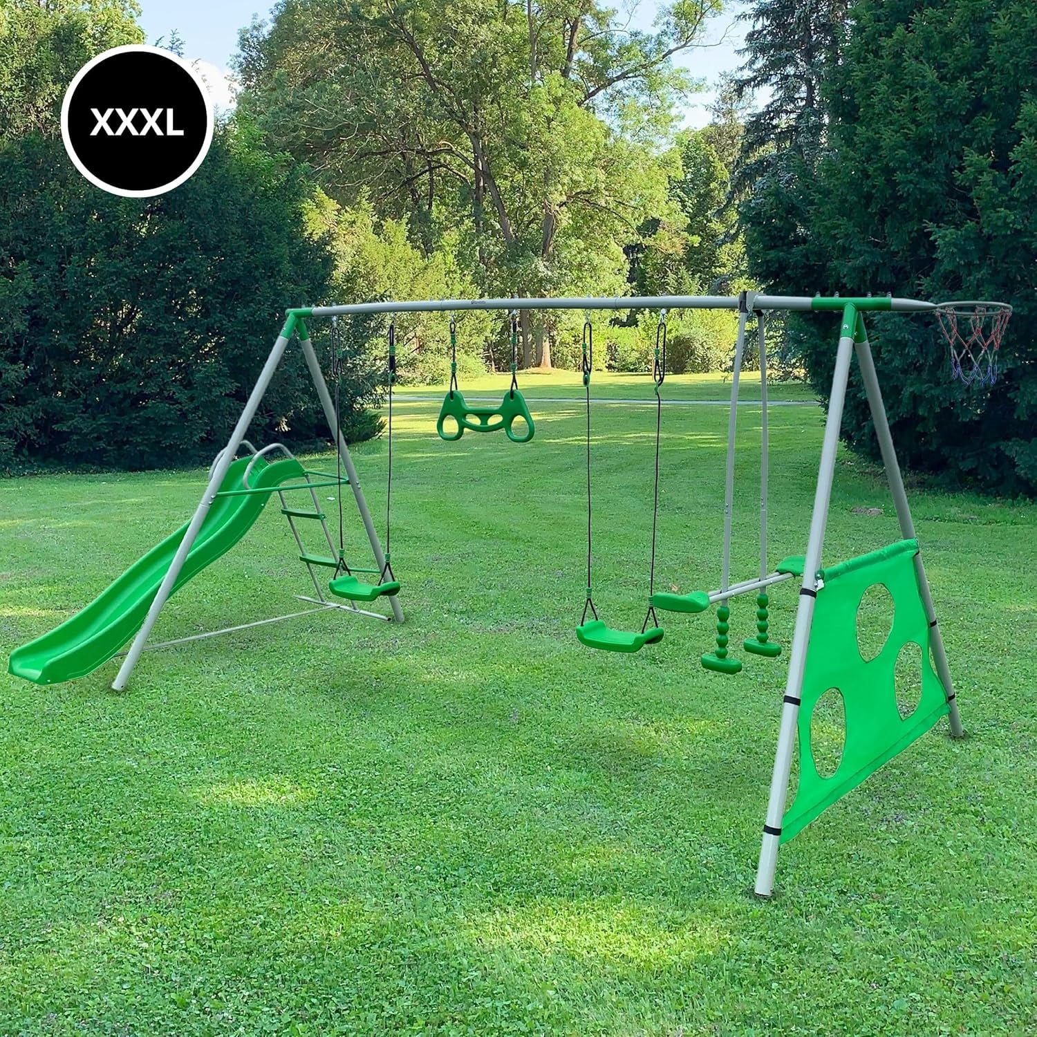 The HyperMotion SWING HYP9 Playground Set fully assembled in a grassy backyard, featuring a slide, swings, trapeze, basketball hoop, and football goal.