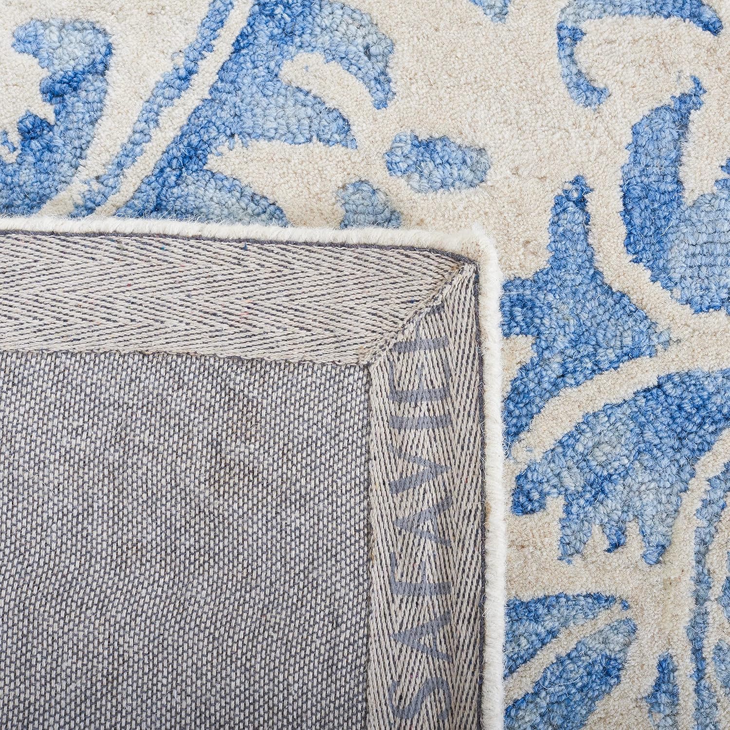 Blue and Ivory Hand-Tufted Wool 8' x 10' Area Rug