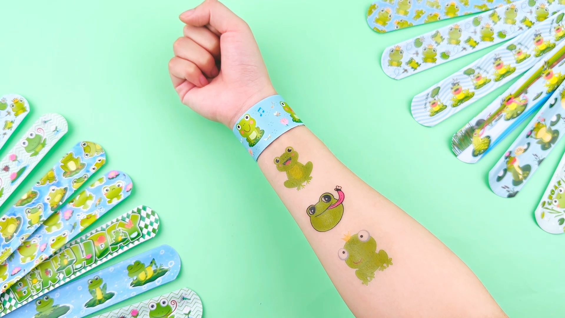 110 PCS Frog Party Favors Kit - Temporary Tattoos, Slap Bracelets, Keychains, Stickers & Gift Bags