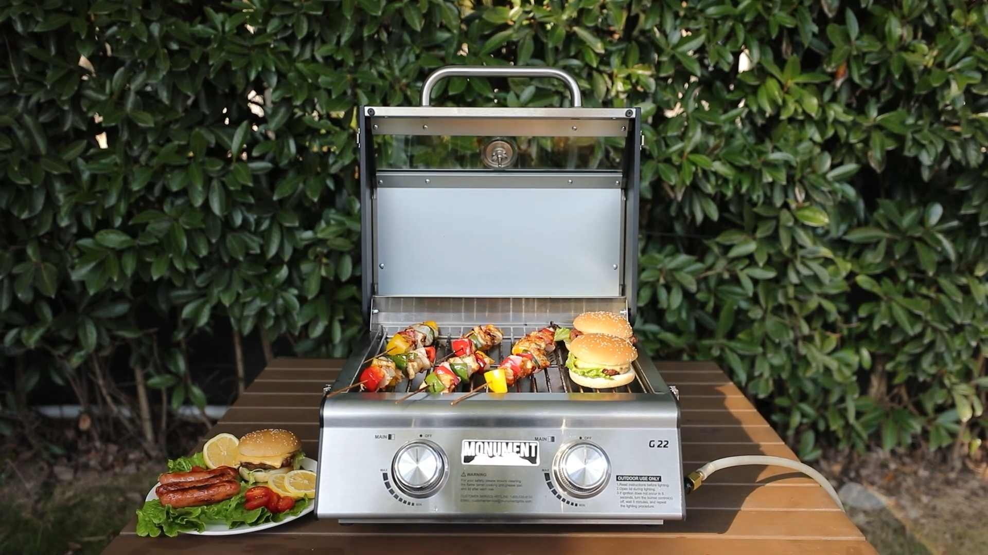 Monument Grills Portable 2-Burner Propane Gas Grill - 30,000 Total BTU, Clearview Glass Lid, Stainless Steel, Tabletop For Camping
