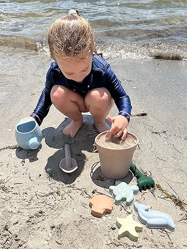 Vista 5 de Juguetes de playa de silicona, juego de cubo de playa con pala, 4 moldes de arena, juguetes de arena para niños aptos para viajes, en bolsa de Rosa