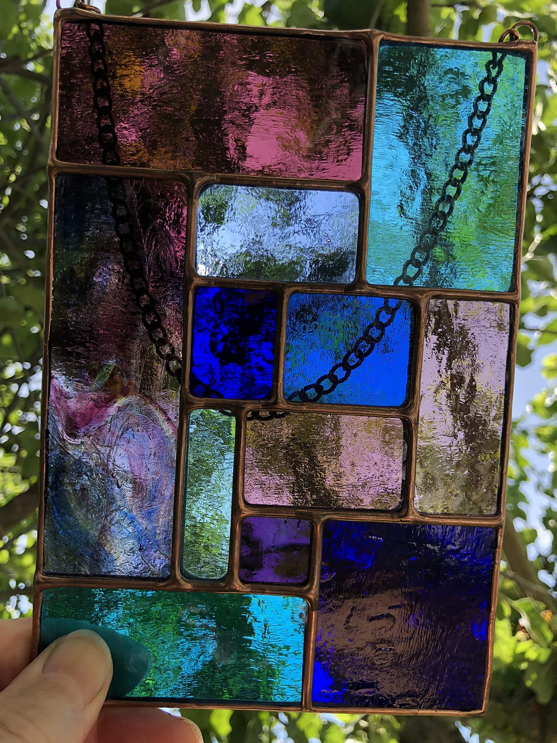 Pannello acchiappasole in vetro colorato, blu e viola, color rame, arte astratta