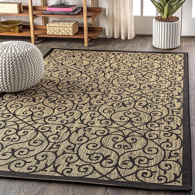 Made with easy-cleaning materials, this rug is perfect for busy households and outdoor spaces. The black and khaki color scheme adds a touch of elegance to any room, while the vintage filigree textured weave adds a unique and sophisticated look.