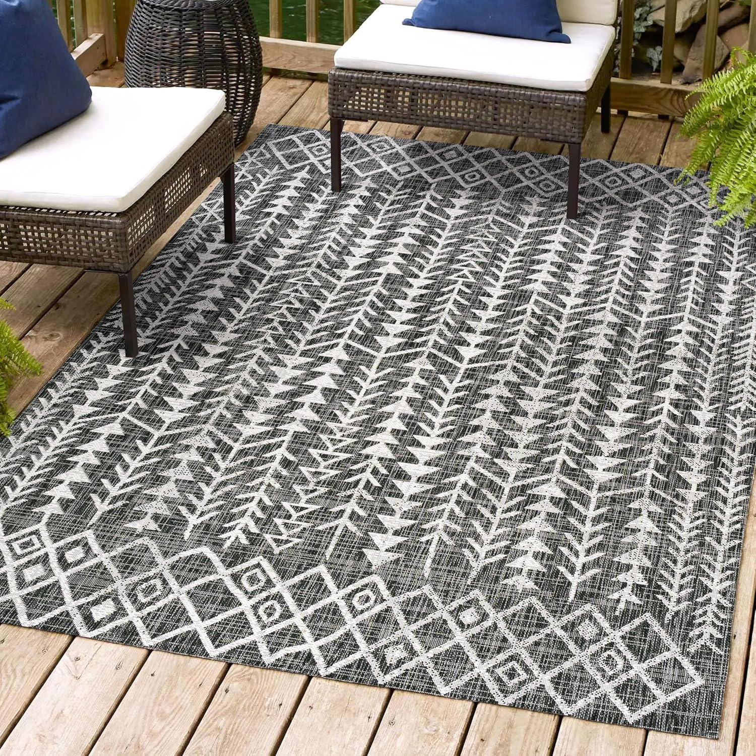 4' x 6' Black and Ivory Geometric Synthetic Area Rug