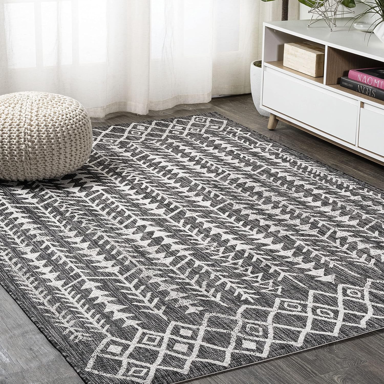4' x 6' Black and Ivory Geometric Synthetic Area Rug