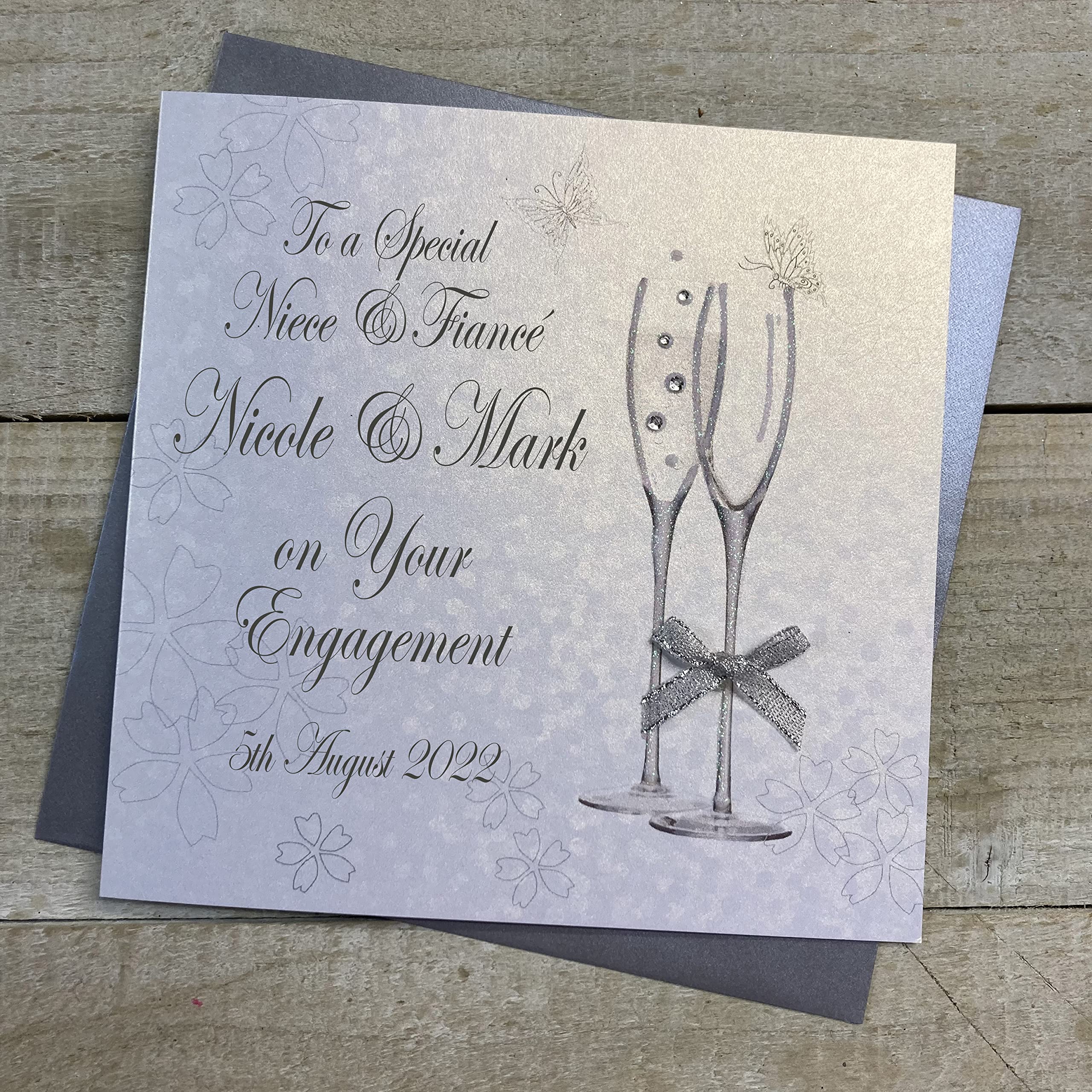 WHITE COTTON CARDS PERSONALISED ENGAGEMENT CARD. ANY RELATION. NIECE & FIANCÉ. CHAMPAGNE FLUTES DESIGN. Handmade (P22-34-NIE & XP22-34-NIE)