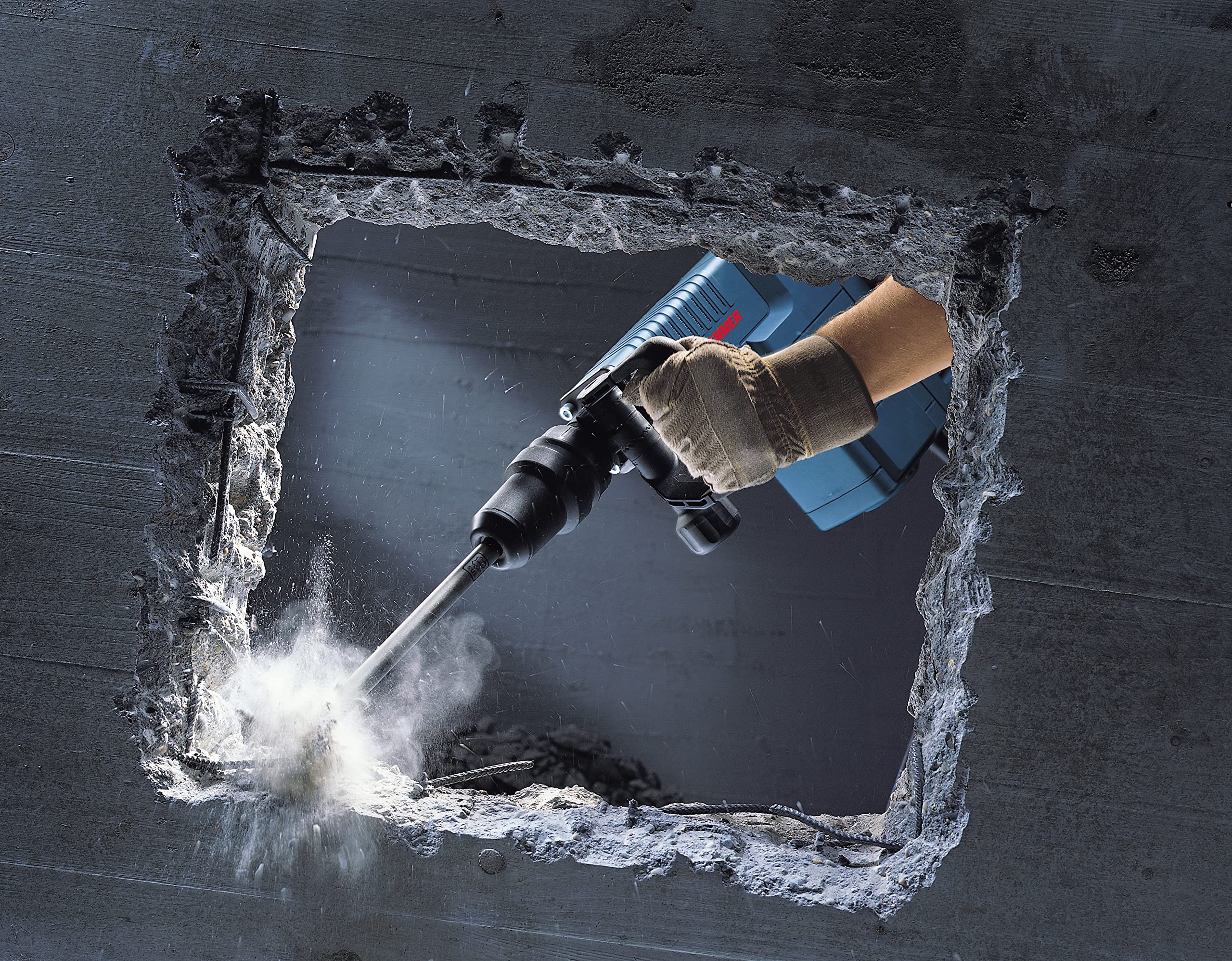 Bosch Professional: młot udarowy GSH 11 E (1 500 W, liczba udarów przy nominalnej prędkości obrotowej 900 – 1.890 min-1, rękojeść dodatkowa, 1 dłuto płaskie, smar w tubie, sukno maszynowe, walizka)