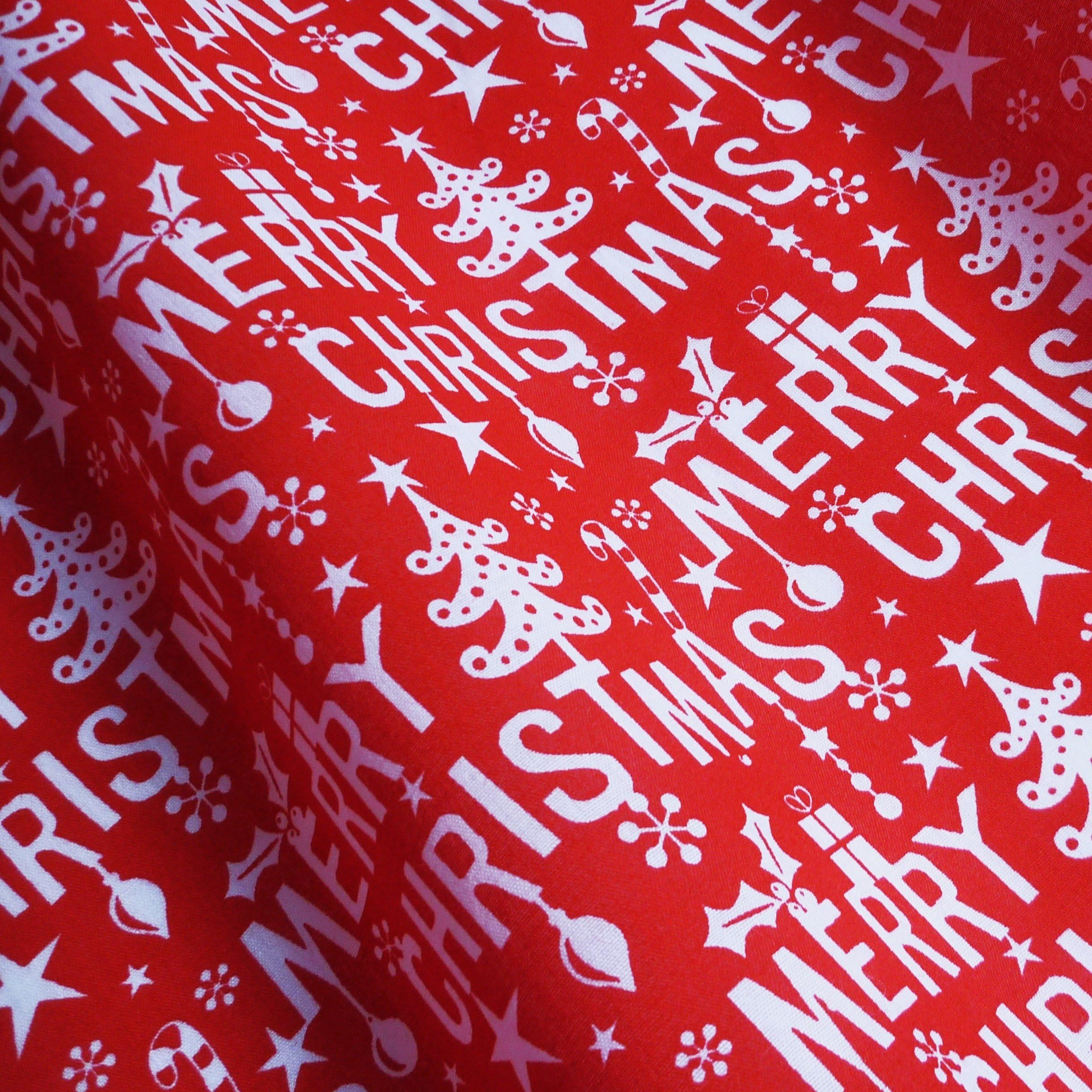 Red Polycotton Fabric with Merry Christmas Print (Per Metre) by Nortex Mill
