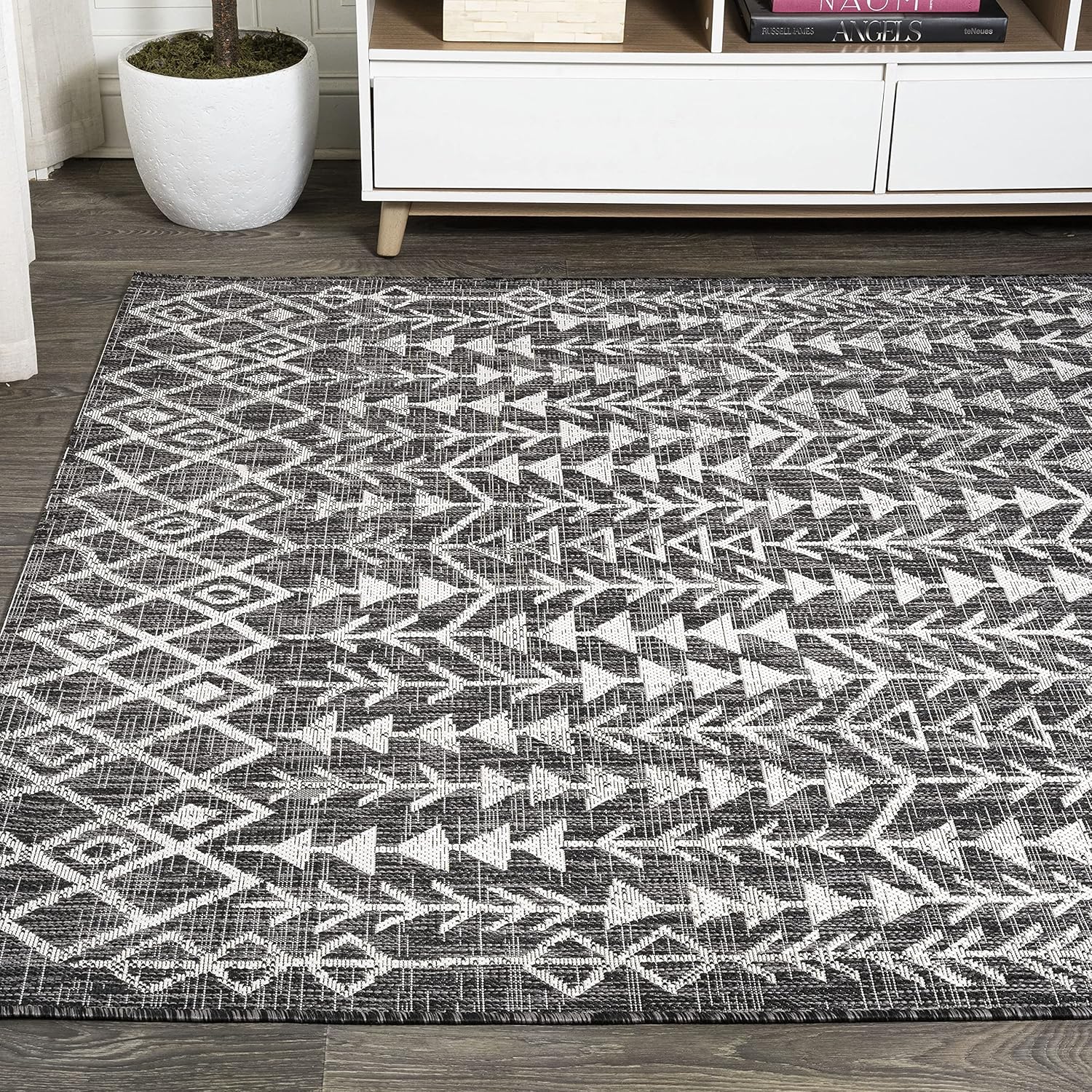 4' x 6' Black and Ivory Geometric Synthetic Area Rug