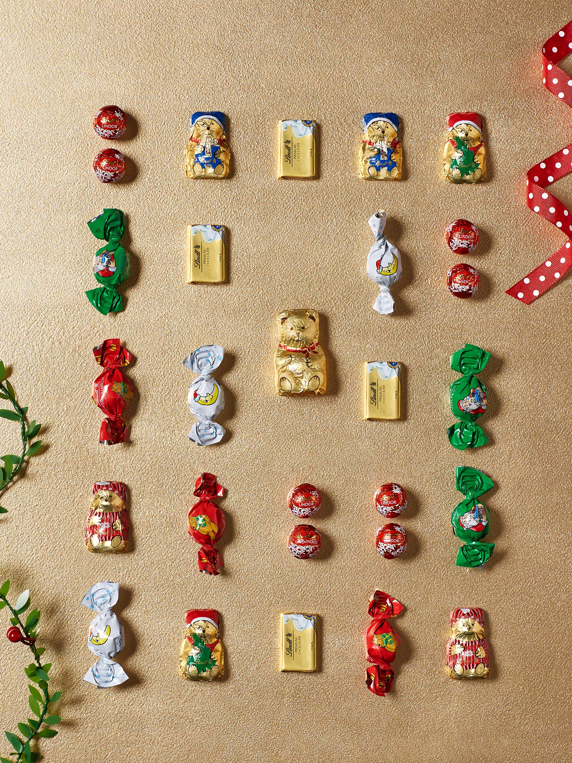Lindt - Calendario dell'Avvento a forma di orsacchiotto con cioccolato al latte, 172 g