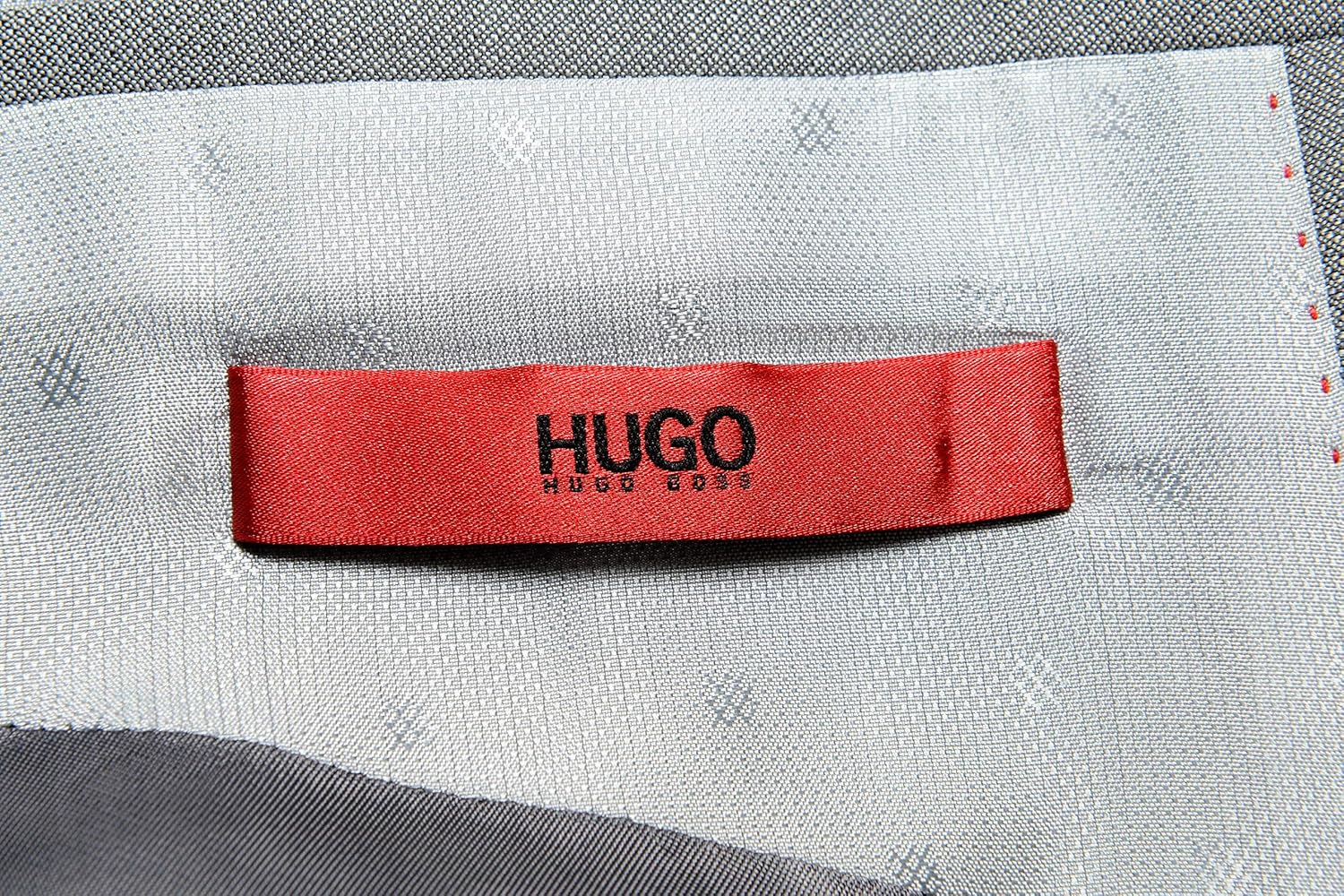 Close-up of the Hugo Boss brand label inside the suit