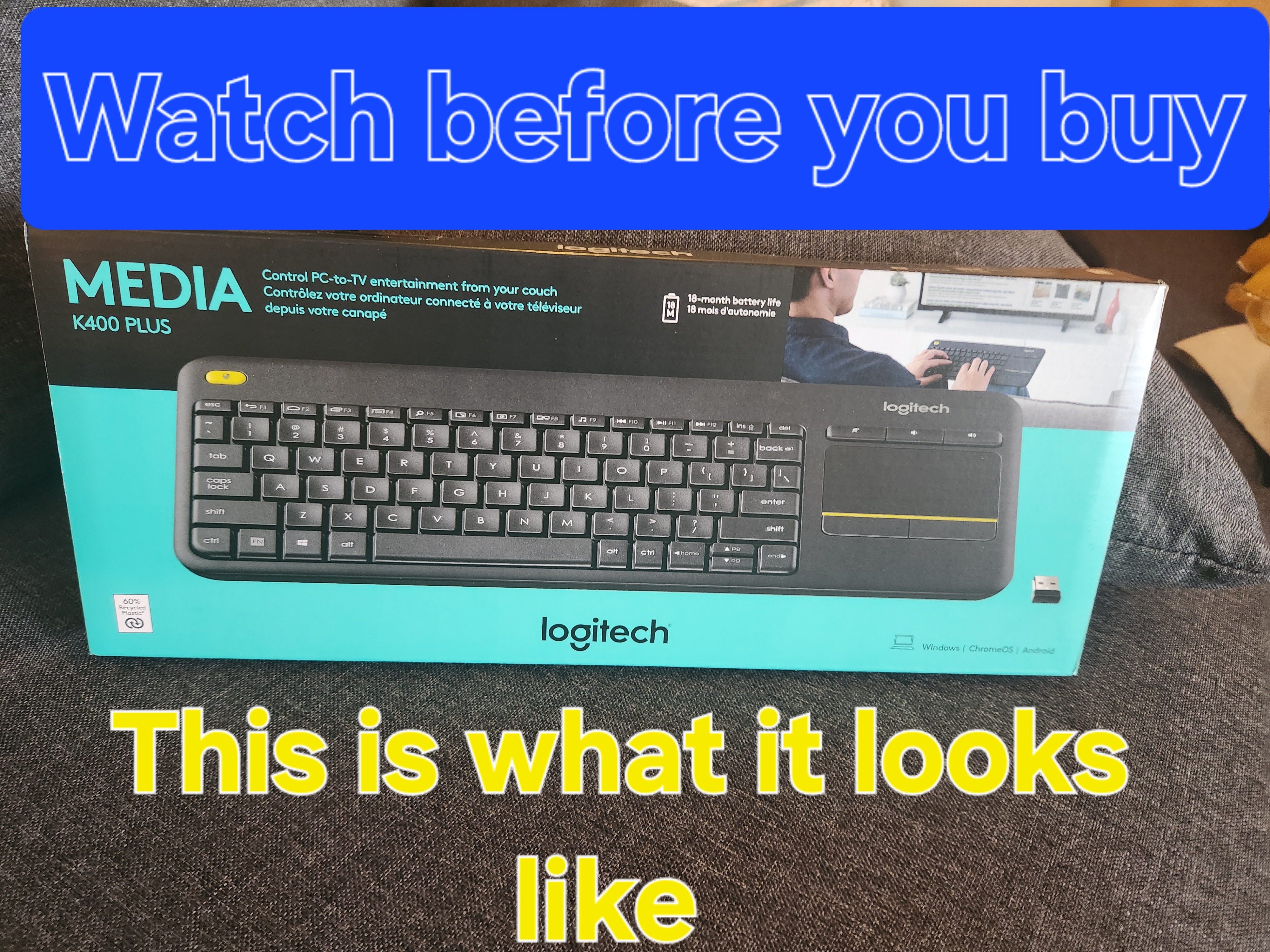 Logitech K400 Plus touchpad with finger demonstrating use