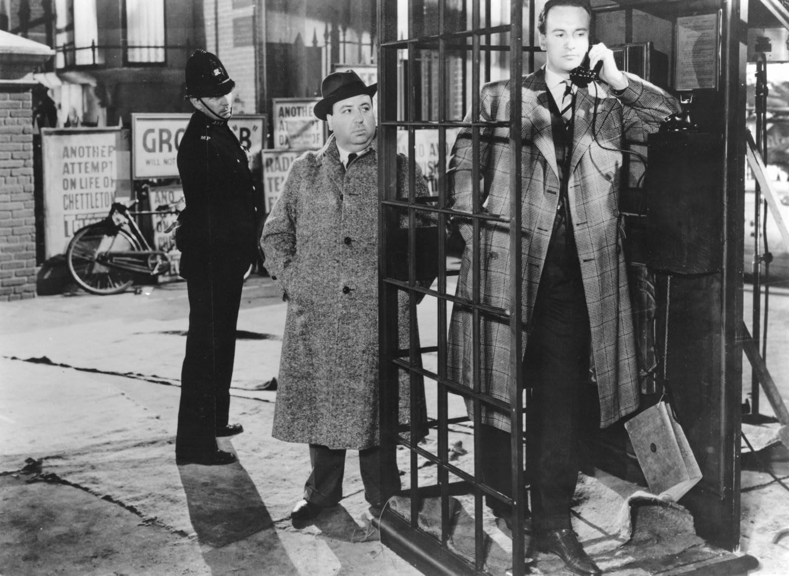 Unknown, Alfred Hitchcock and George Sanders in Rebecca (1940)