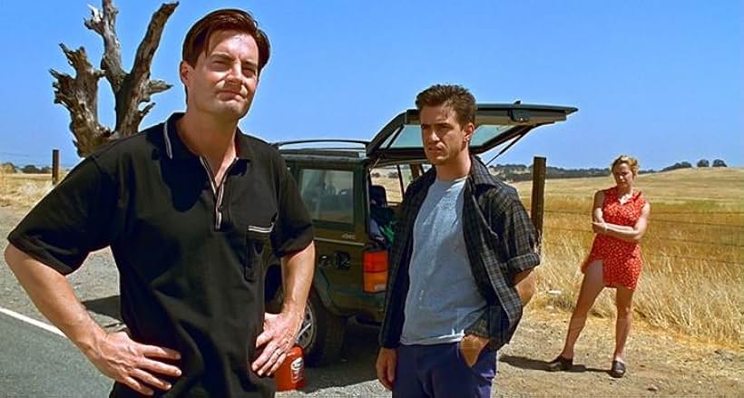 Elisabeth Shue, Dermot Mulroney, and Kyle MacLachlan in The Trigger Effect (1996)
