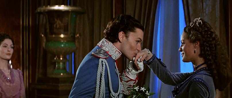 Helmut Berger, Romy Schneider, and Sonia Petrovna in Ludwig (1973)