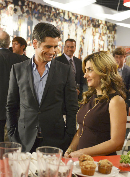 John Stamos and Callie Thorne in Necessary Roughness (2011)