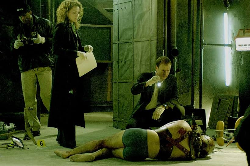 Dina Meyer, Donnie Wahlberg, and Noam Jenkins in Saw II (2005)