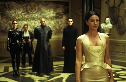 Keanu Reeves, Laurence Fishburne, Monica Bellucci, Carrie-Anne Moss, and Randall Duk Kim in The Matrix Reloaded (2003)