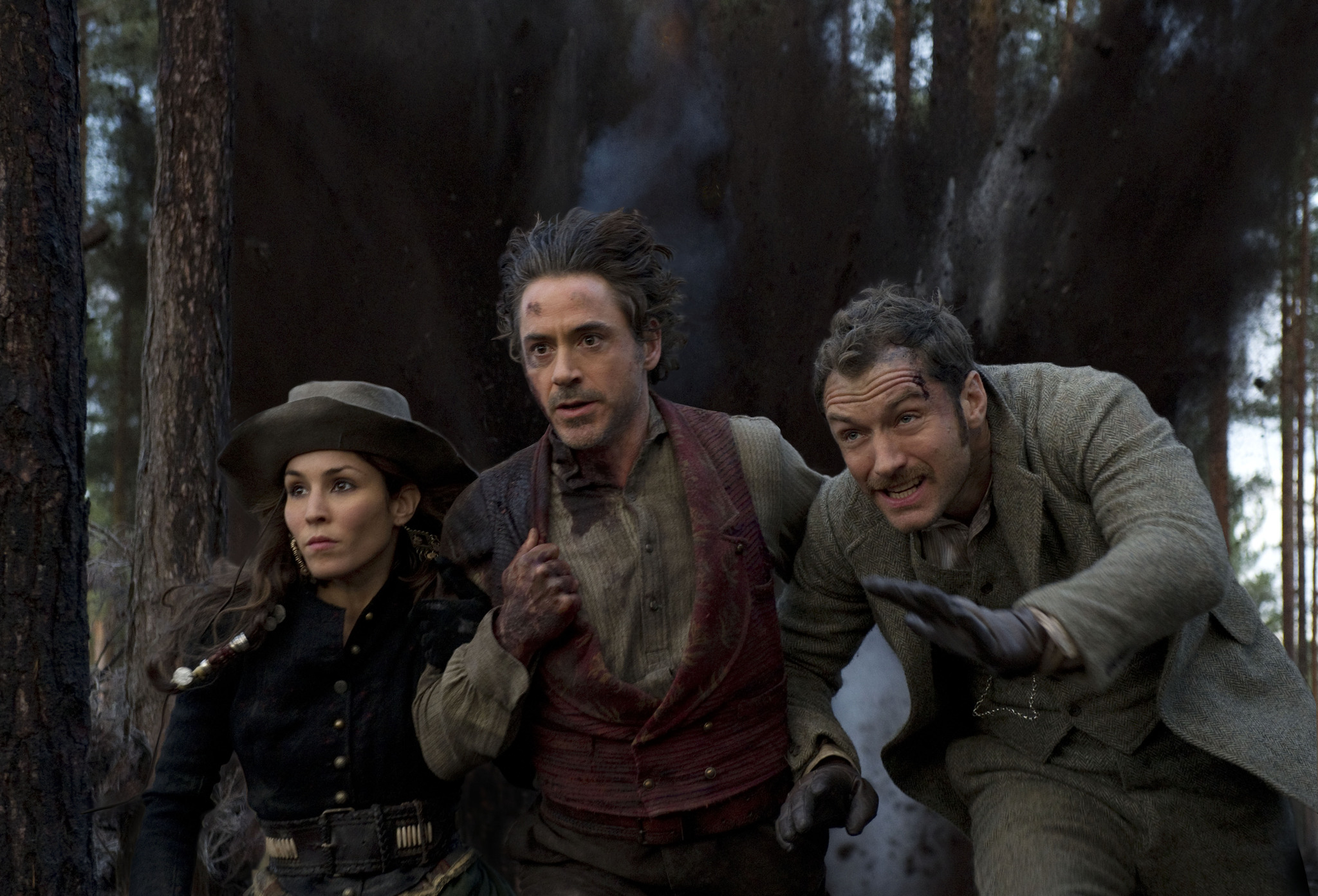 Jude Law, Robert Downey Jr., and Noomi Rapace in Sherlock Holmes: A Game of Shadows (2011)