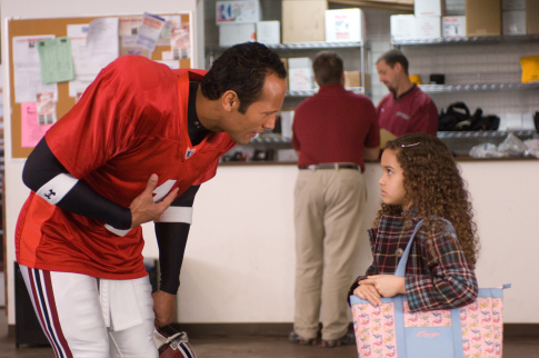 Dwayne Johnson and Madison Pettis in The Game Plan (2007)