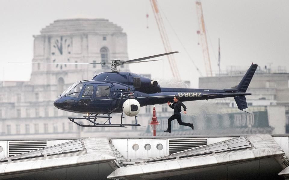 Marc Wolff flying a camera helicopter at low level in central London very close to Tom Cruise on Mission Impossible: Fallout - London