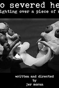 Primary photo for Two Severed Heads (Fighting Over a Piece of Meat) Primary photo for Two Severed Heads (Fighting Over a Piece of Meat)