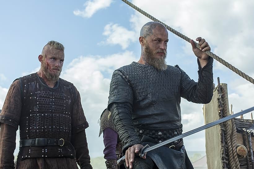 Katheryn Winnick, Travis Fimmel, and Alexander Ludwig in Vikings (2013)