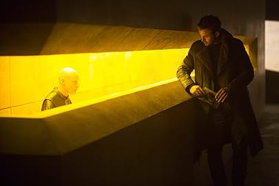 Ryan Gosling and Tómas Lemarquis in Blade Runner 2049 (2017)