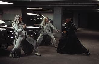 Laurence Fishburne, Adrian Rayment, and Neil Rayment in The Matrix Reloaded (2003)