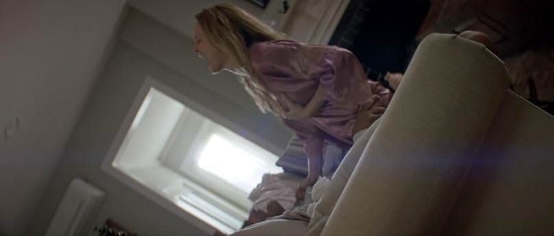 Johnathon Schaech and Heather Graham in Suitable Flesh (2023)