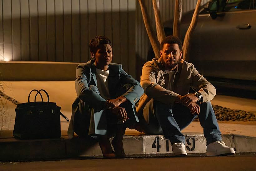 Michael Ealy and Emayatzy Corinealdi in Reasonable Doubt (2022)