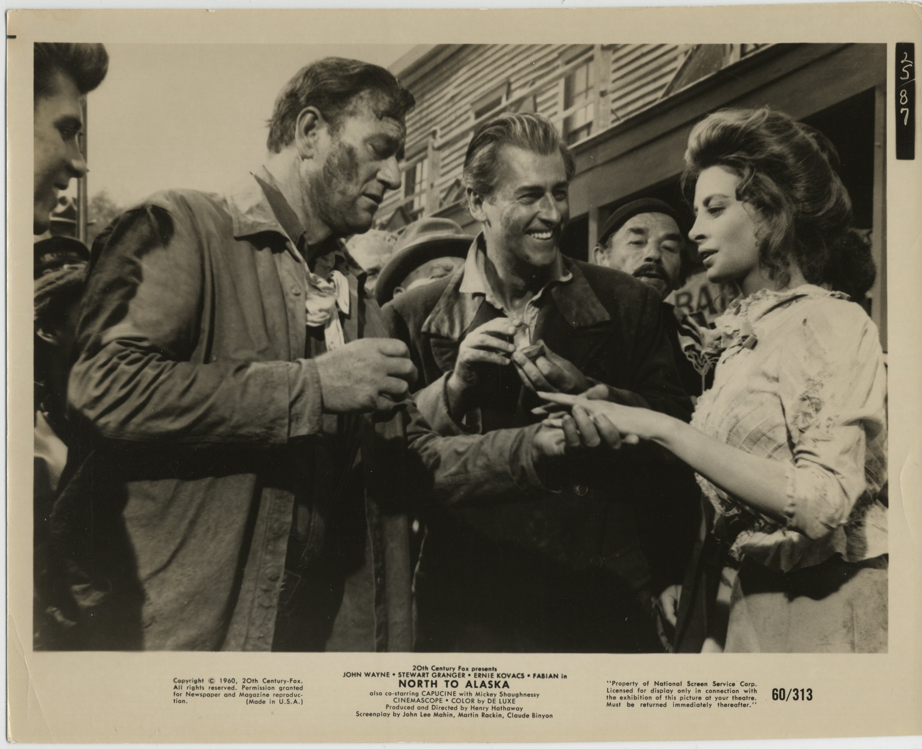 John Wayne, Capucine, Stewart Granger, and Fabian in North to Alaska (1960)