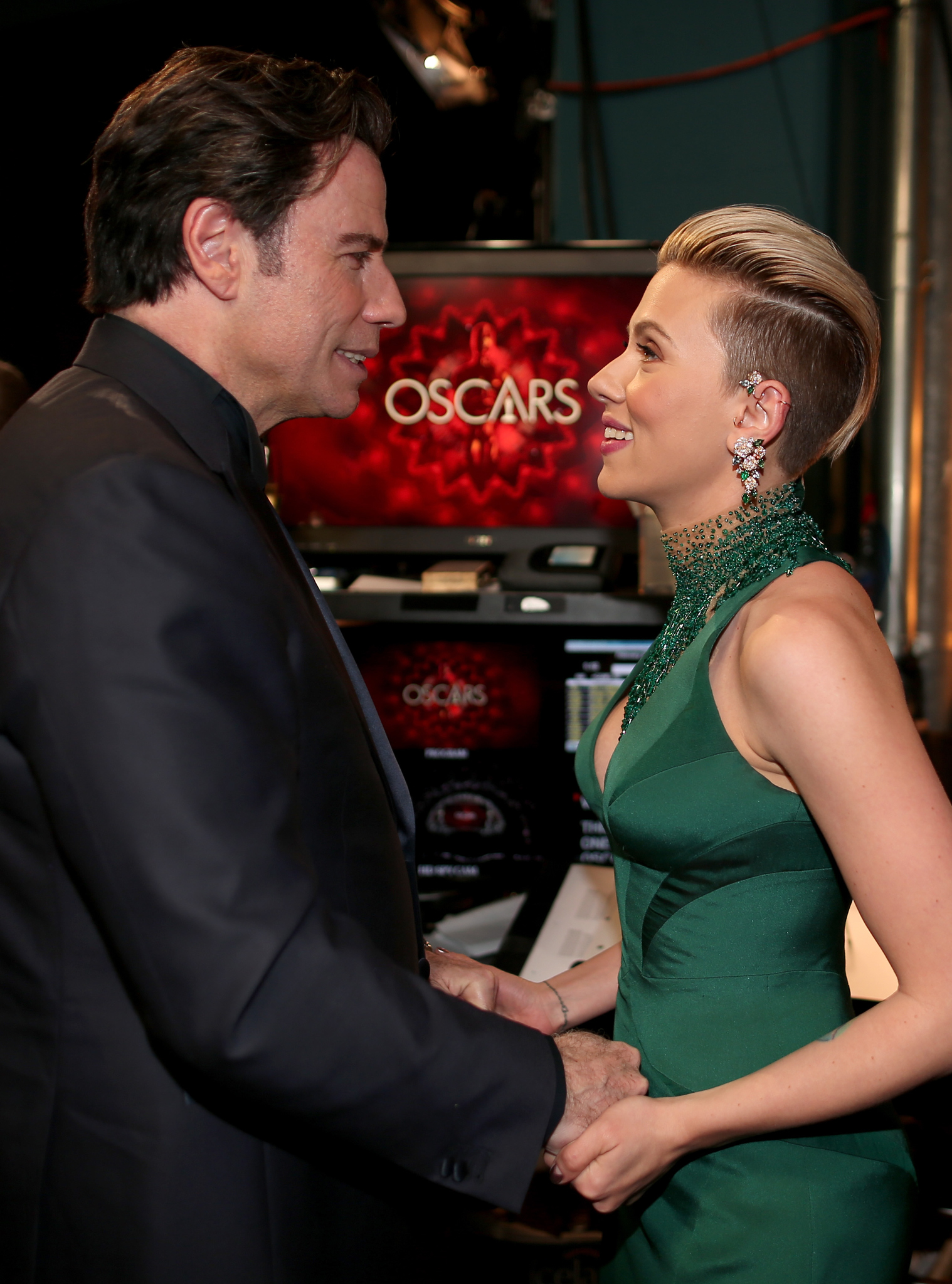 John Travolta and Scarlett Johansson at an event for The Oscars (2015)