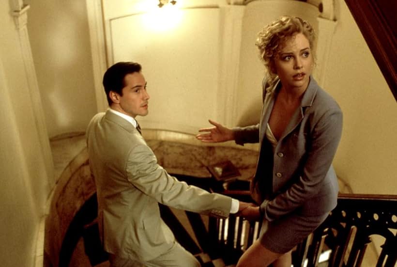Keanu Reeves and Charlize Theron in The Devil's Advocate (1997)