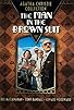 Primary photo for The Man in the Brown Suit Primary photo for The Man in the Brown Suit