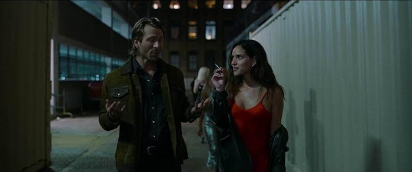 Glen Powell and Adria Arjona in Hit Man (2023)