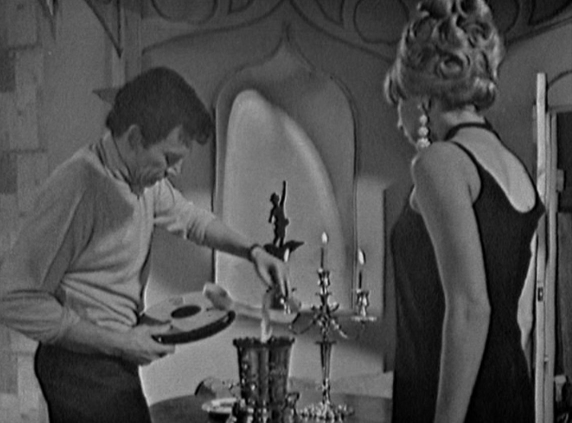Amber Kammer and Peter Wyngarde in First Steal Six Eggs (1966)