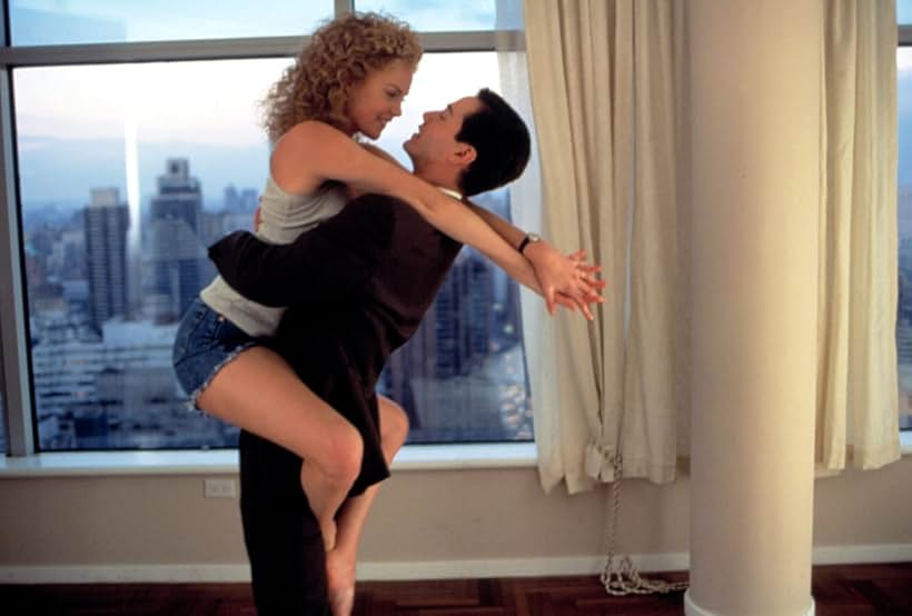 Keanu Reeves and Charlize Theron in The Devil's Advocate (1997)