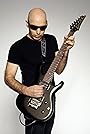 Joe Satriani's primary photo Joe Satriani's primary photo