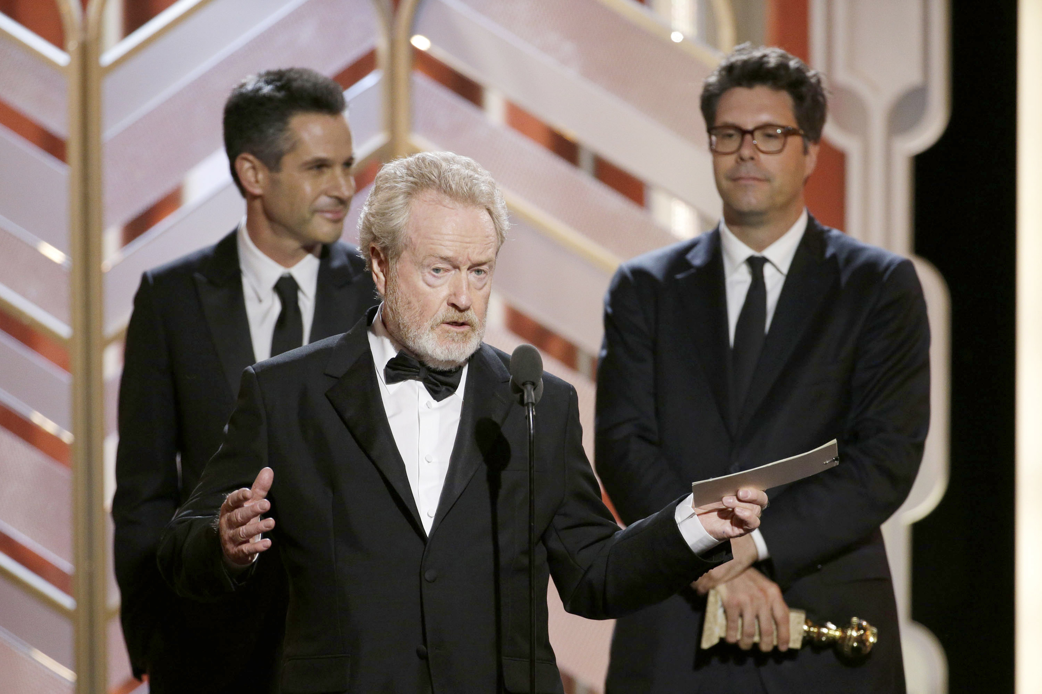 Ridley Scott, Michael Schaefer, and Simon Kinberg at an event for 73rd Golden Globe Awards (2016)