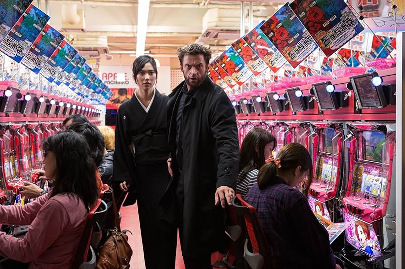 Hugh Jackman and Tao Okamoto in X-рдореЕрди: рд╡реБрд▓рд╡рд░реАрди 2 (2013)