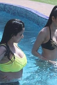 Primary photo for Day 18: Bikini clad Mona-Lopa turn on the heat! Primary photo for Day 18: Bikini clad Mona-Lopa turn on the heat!