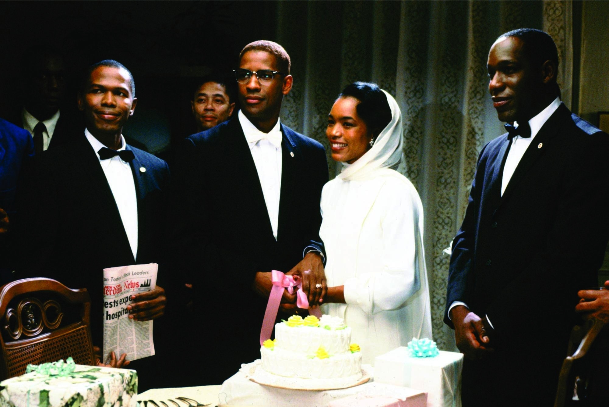 Denzel Washington, Angela Bassett, James McDaniel, and Ernest Thomas in Malcolm X (1992)