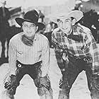 Hoot Gibson and Skeeter Bill Robbins in Wild Horse (1931)