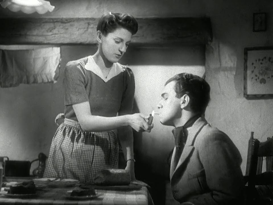 Janique Joelle and John Blythe in Bon Voyage (1944, dir. Alfred Hitchcock)