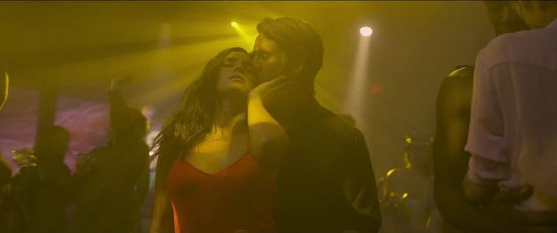 Glen Powell and Adria Arjona in Hit Man (2023)